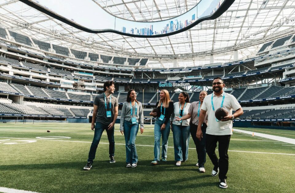 Visitors walking on the field during a SoFi Stadium tour