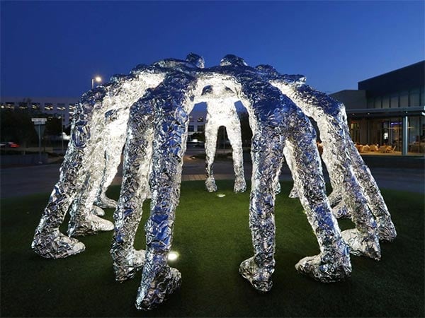 Sculpture titled Huddle in the stadium collection