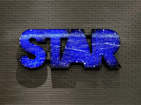 Star-shaped artwork displayed inside AT&T Stadium