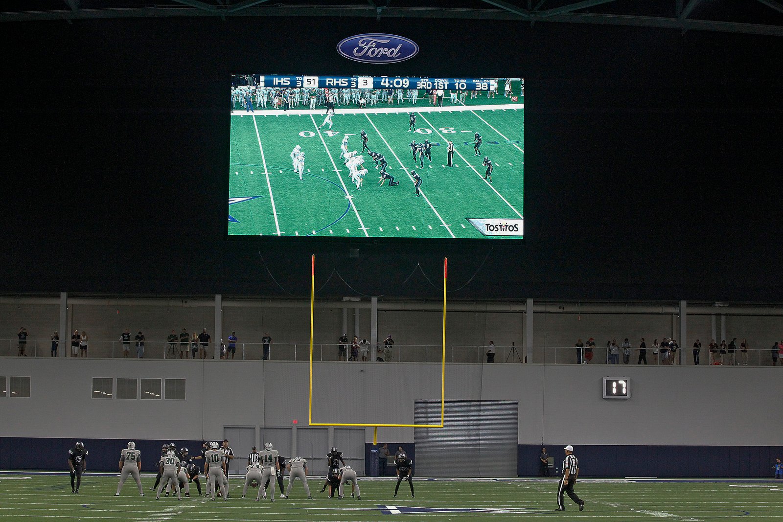 Large video board inside Ford Center at The Star in Frisco