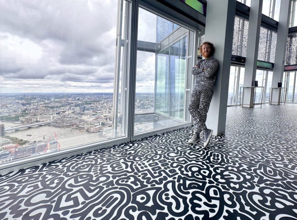 London skyline seen through the viewing gallery windows at The View from The Shard