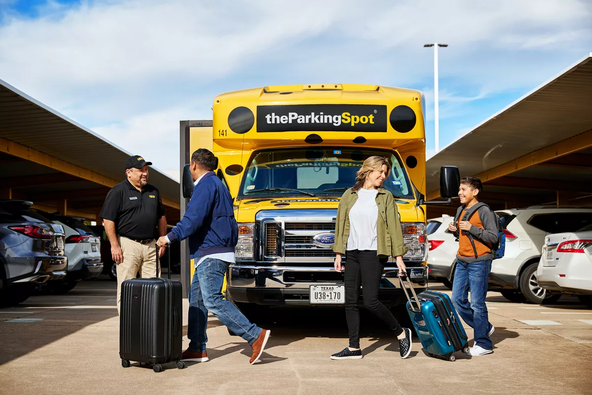Travellers boarding an airport parking shuttle