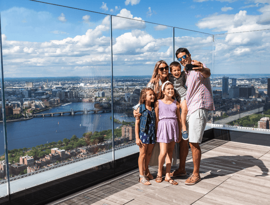 Family enjoying the observation deck at View Boston
